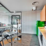 Modern Office Kitchen Area with Sink and Coffee Machine