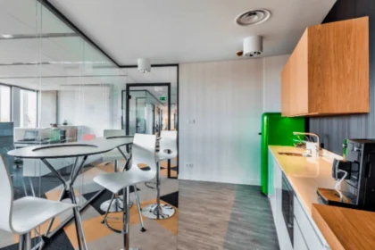 Modern Office Kitchen Area with Sink and Coffee Machine